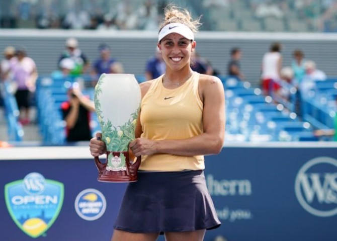 Madison Keys holding title