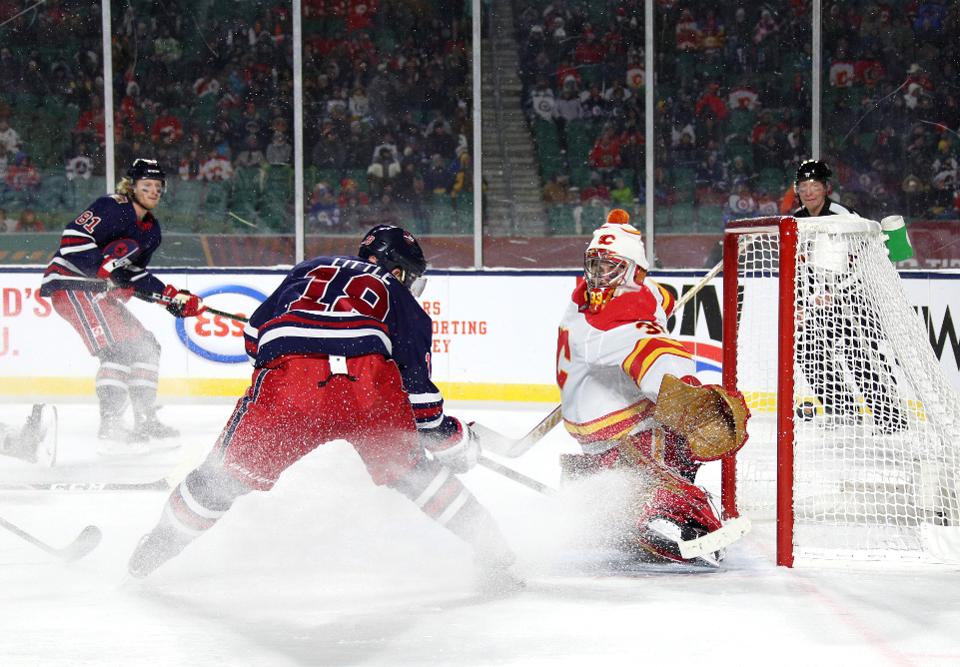 Jets win the Heritage Classic Beating the Flames after OT, 2-1